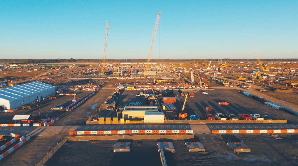 Wide aerial view of active mission-critical construction project